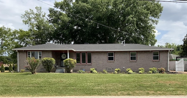 single story home with a front yard