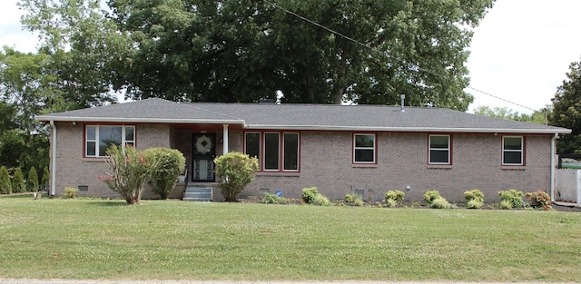 ranch-style home with a front lawn