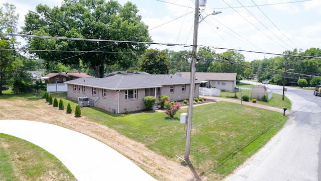 single story home with a front yard