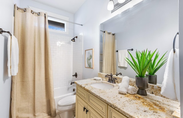 full bathroom with vanity, toilet, and shower / bath combo with shower curtain