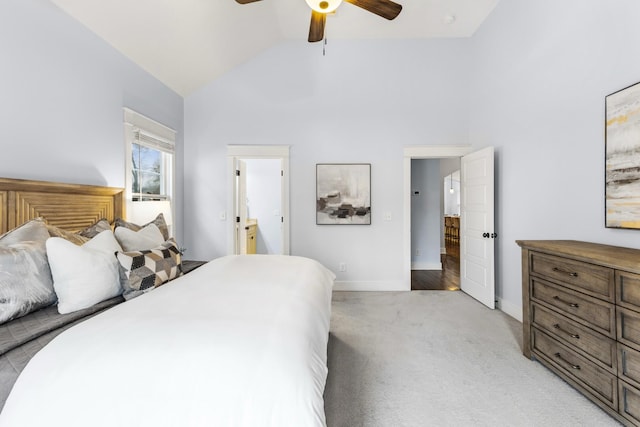 bedroom with lofted ceiling, light carpet, and ceiling fan