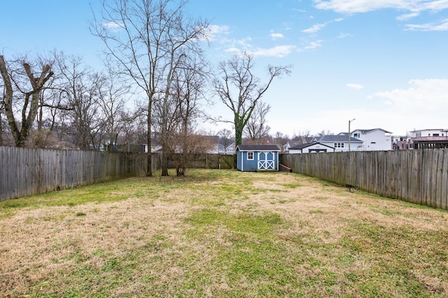 view of yard with a storage shed