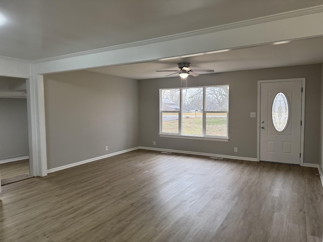 entrance foyer with dark wood-type flooring and ceiling fan