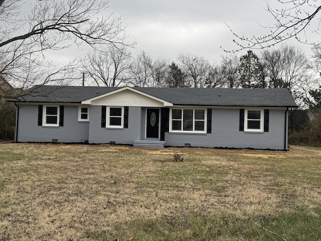 ranch-style house with a front lawn