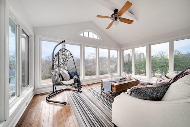 sunroom / solarium with vaulted ceiling and ceiling fan