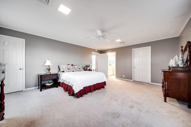 bedroom with light carpet, crown molding, and ceiling fan