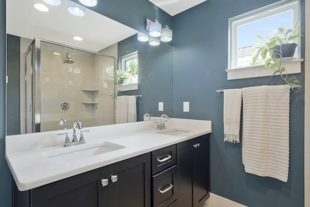 bathroom featuring vanity and walk in shower