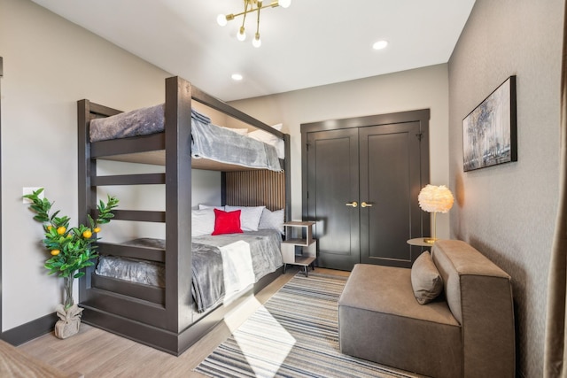 bedroom with light hardwood / wood-style floors