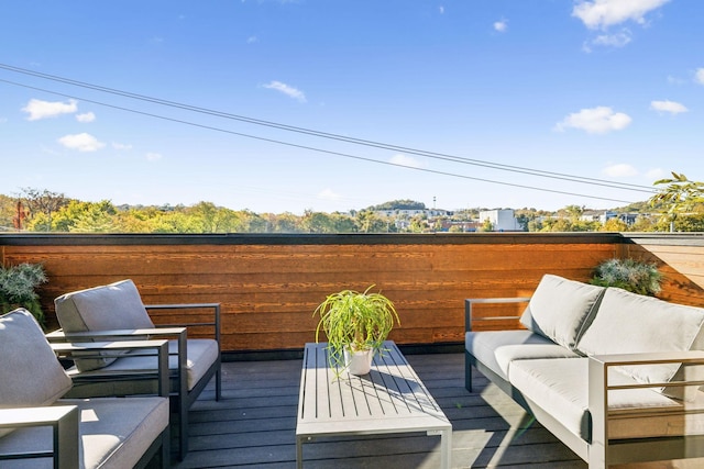 deck with an outdoor hangout area