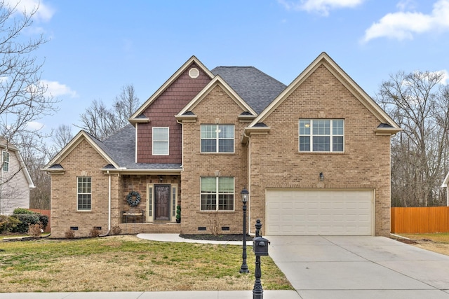 craftsman-style home with a garage and a front lawn