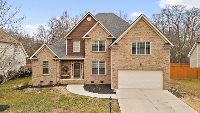 craftsman-style home with a garage and a front yard