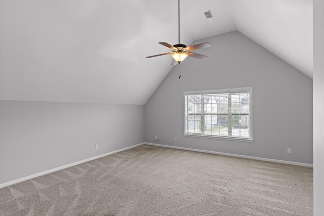 additional living space with light carpet, vaulted ceiling, and ceiling fan