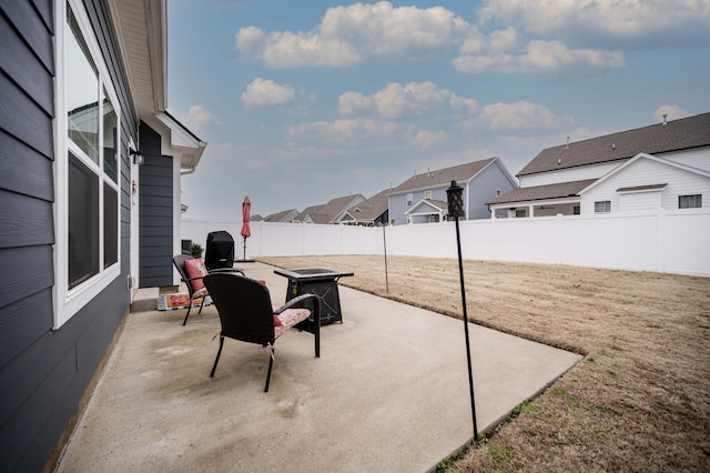 view of patio / terrace featuring a fire pit