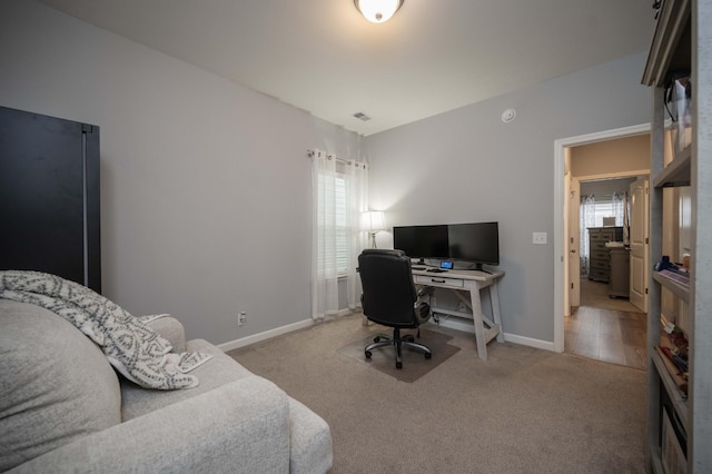 view of carpeted home office