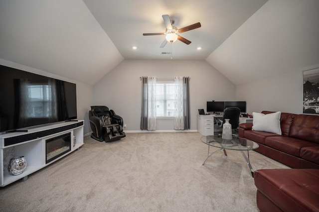 living room featuring light carpet, lofted ceiling, and ceiling fan