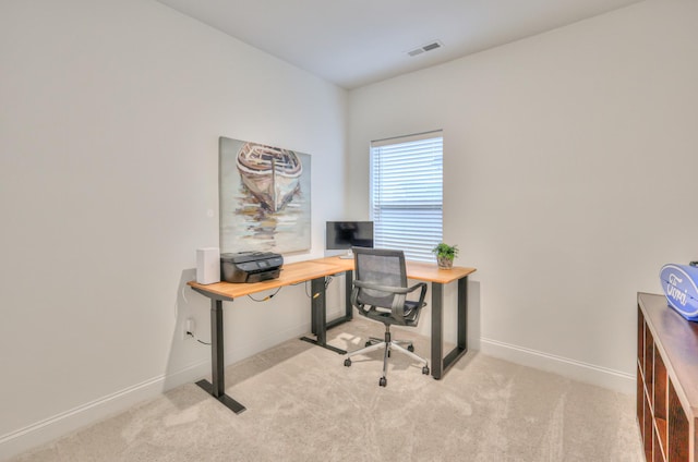 office space featuring light colored carpet