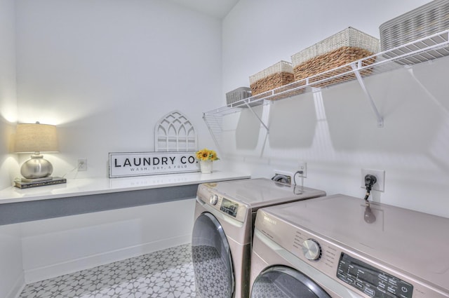 laundry area with washer and dryer