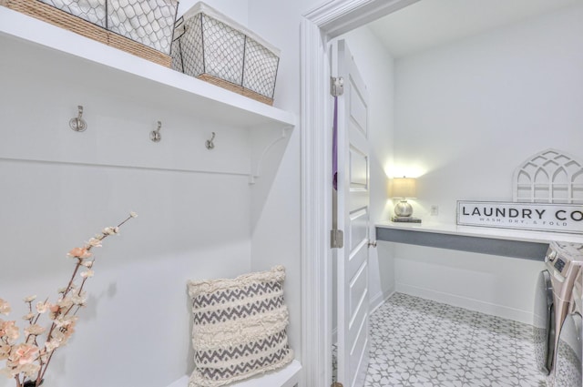 bathroom with washer and dryer