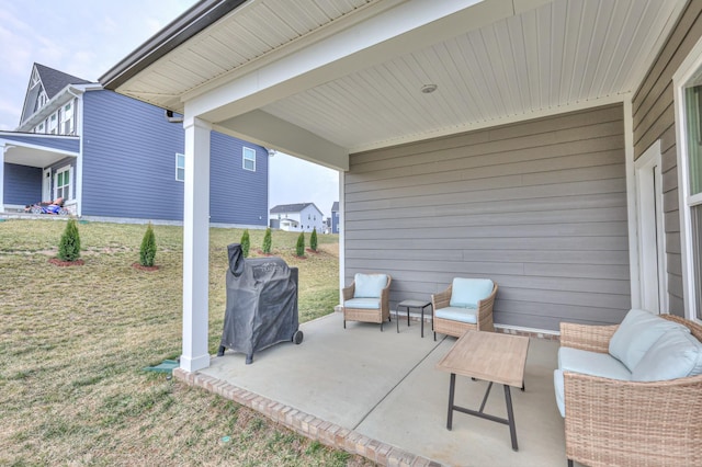 view of patio featuring a grill