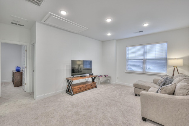 living room featuring light carpet