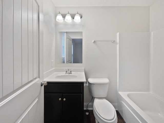 full bathroom featuring vanity, toilet, and tub / shower combination