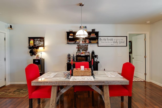 dining room featuring dark wood-type flooring