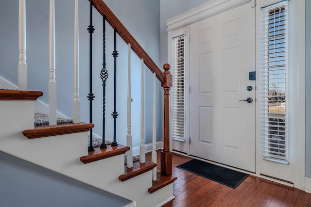 entryway with hardwood / wood-style floors