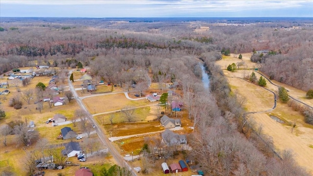 drone / aerial view with a view of trees