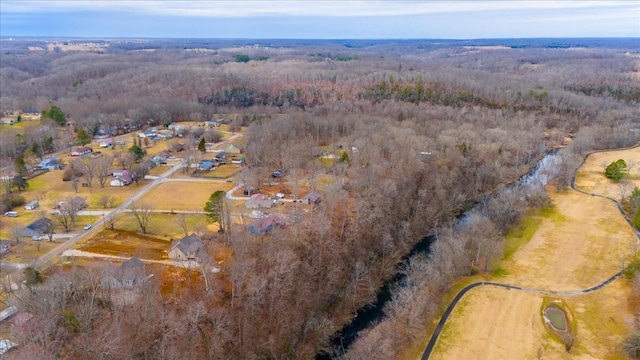 bird's eye view featuring a forest view