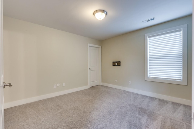 view of carpeted spare room