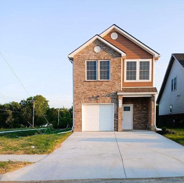 view of front of property featuring a garage