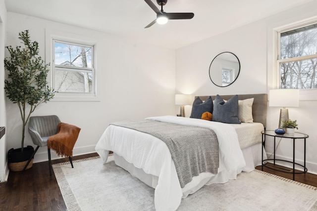 bedroom with hardwood / wood-style flooring and ceiling fan