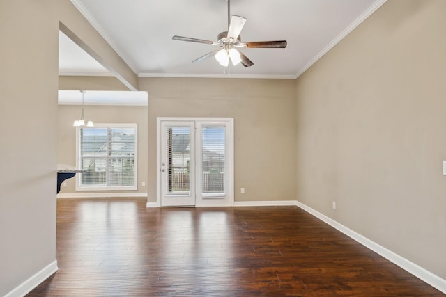 unfurnished room with crown molding, dark wood-type flooring, and ceiling fan with notable chandelier