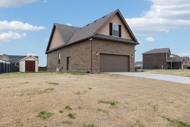 view of side of home with a garage