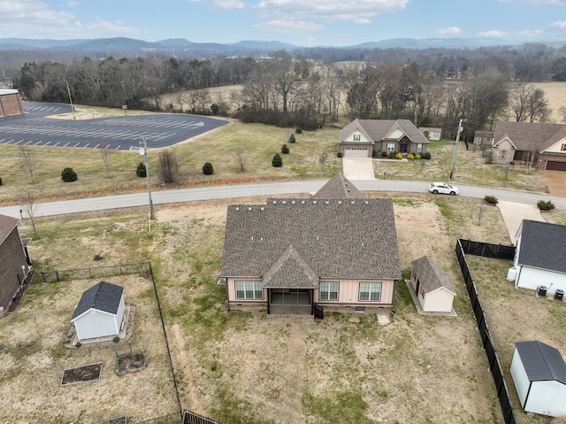 drone / aerial view featuring a mountain view