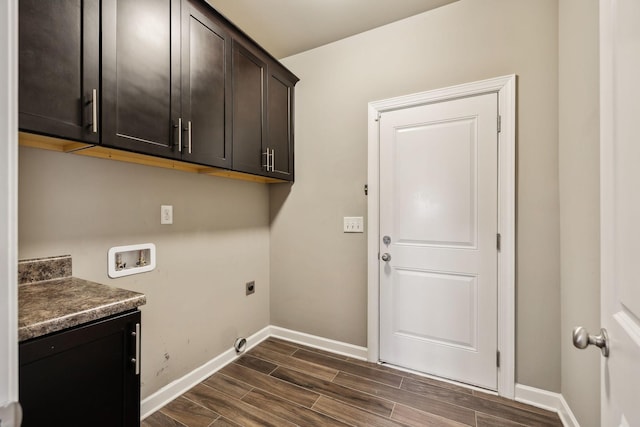 laundry room with washer hookup, cabinets, and hookup for an electric dryer