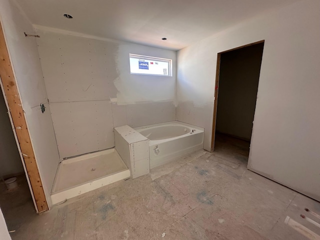 bathroom featuring a tub