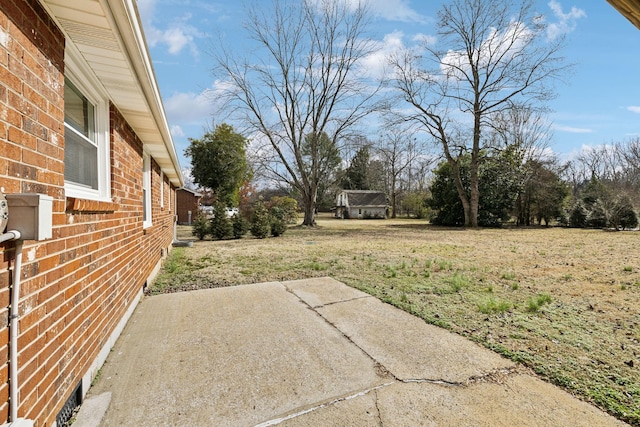 view of yard with a patio area