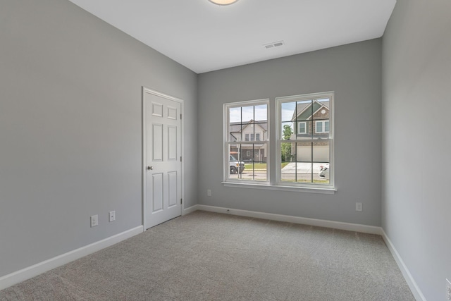 view of carpeted spare room