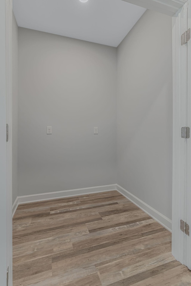 spare room featuring light hardwood / wood-style floors