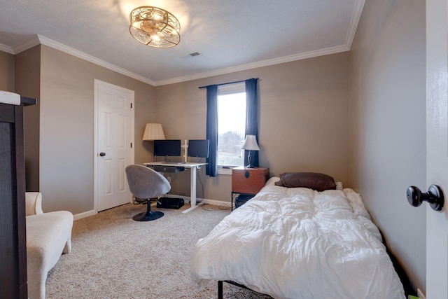 bedroom with ornamental molding and carpet