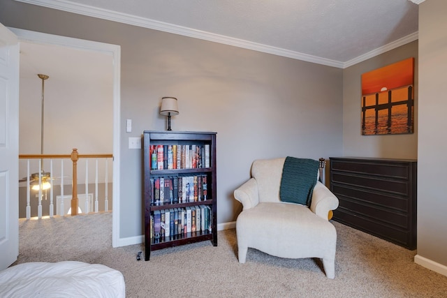 living area with crown molding and light carpet