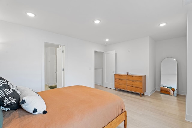 bedroom with light hardwood / wood-style floors