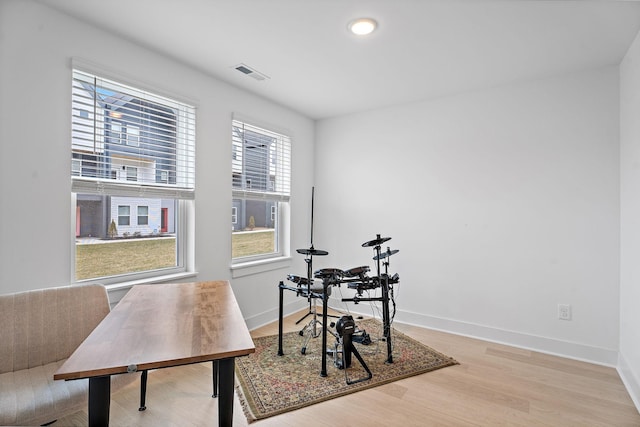 office area with hardwood / wood-style floors