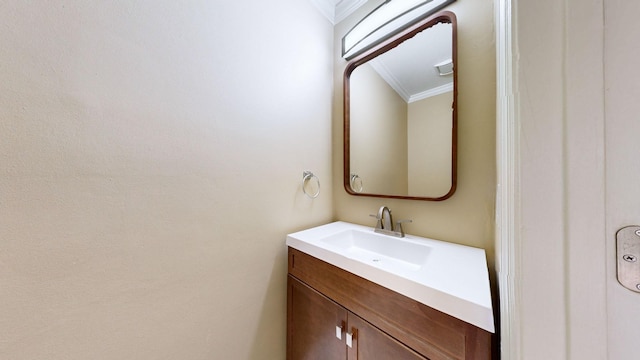 bathroom featuring vanity and ornamental molding