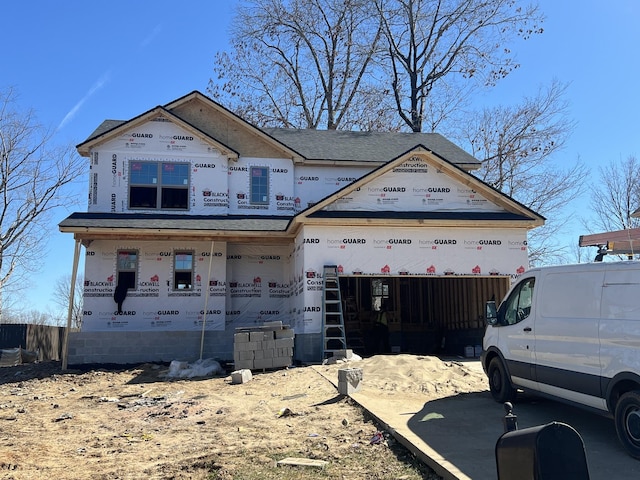 property under construction with a garage