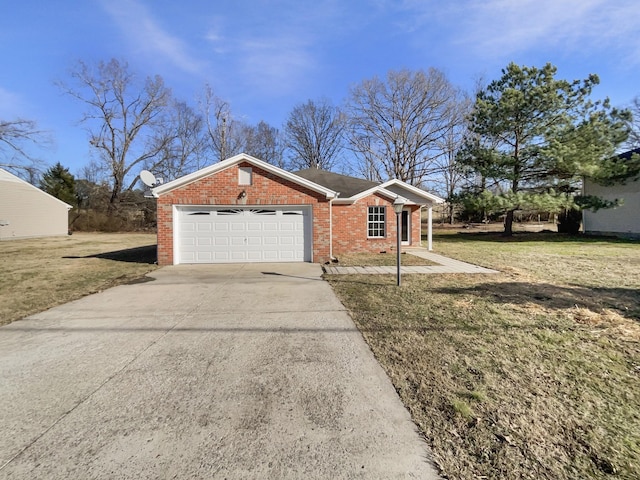 single story home featuring a garage and a front yard