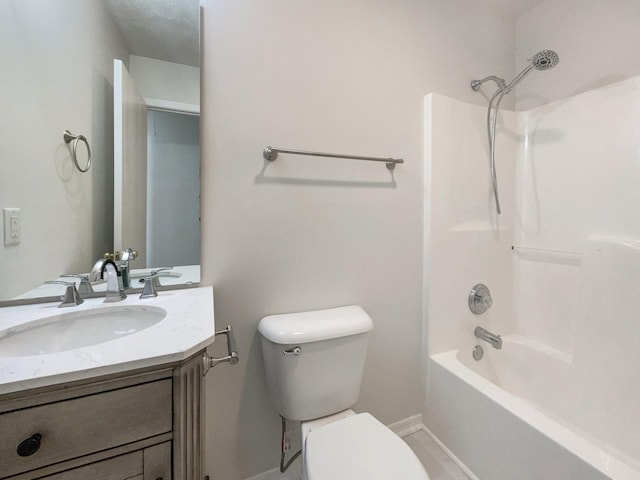 full bathroom with vanity, toilet, and  shower combination