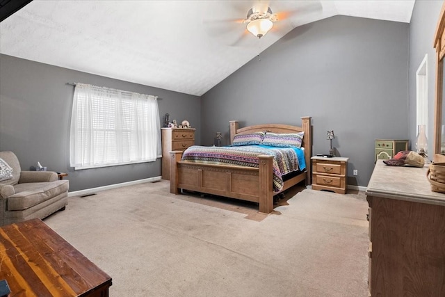 carpeted bedroom with lofted ceiling and ceiling fan