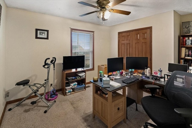 carpeted office with ceiling fan